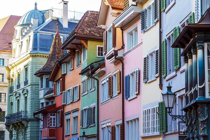 Best of Zürich & Surroundings: Walking Tour, Cable Car and Ferry - Financial district and University quarter: Zurich’s modern rhythm