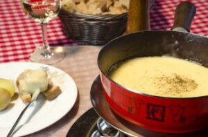 Zurich: Sunset Tour with Cheese Fondue - Lindt Home of Chocolate: where shopping feels like part of the story