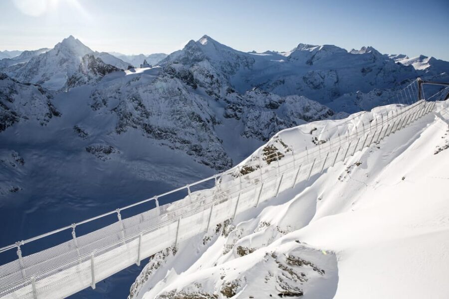 Zurich: Titlis Beginner Ski day snow experience & Lucerne - Titlis at 3,000+ Meters: Rotair Cable Car, Glacier Cave, and Cliff Walk